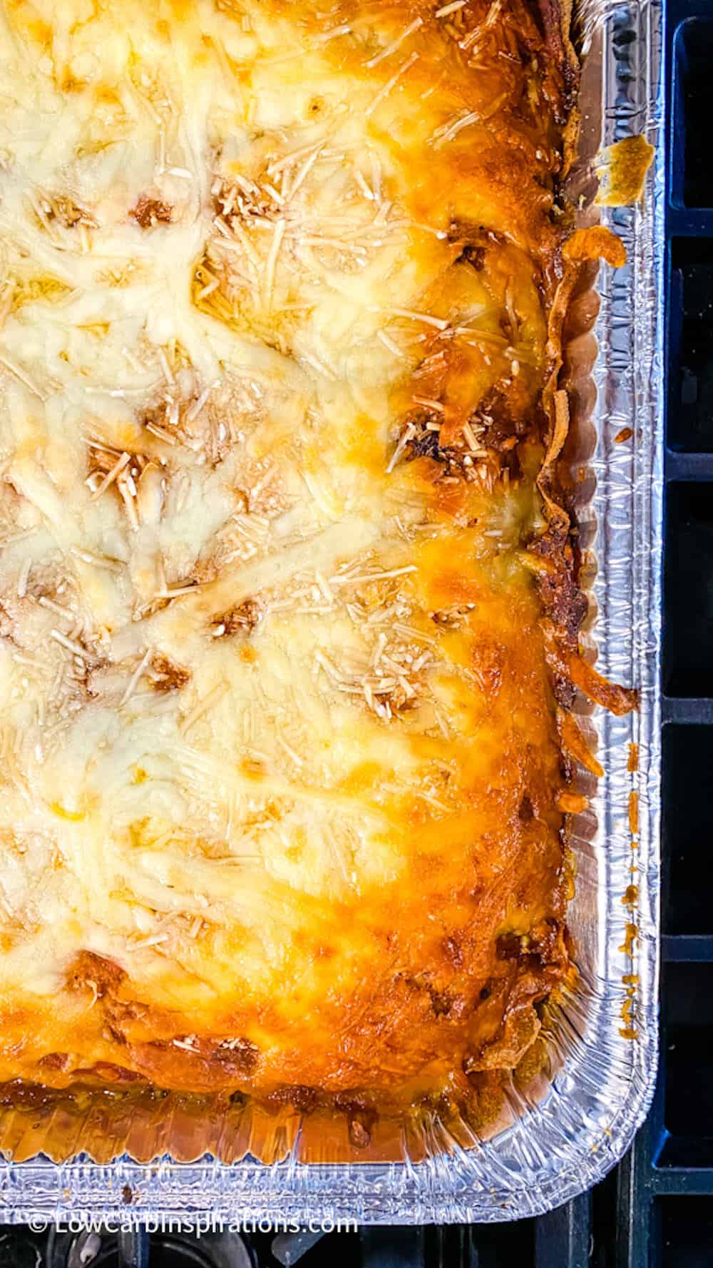 Close up of baked Lasagna with melted cheese on top