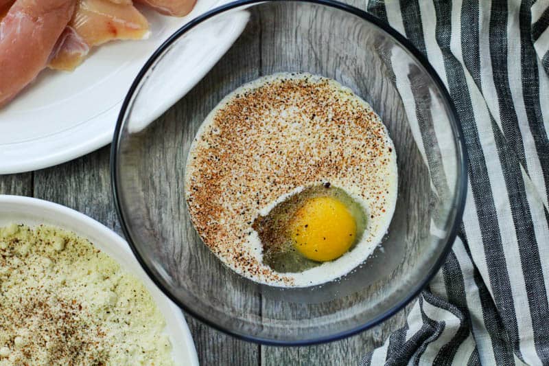 egg, buttermilk, and spices in a bowl