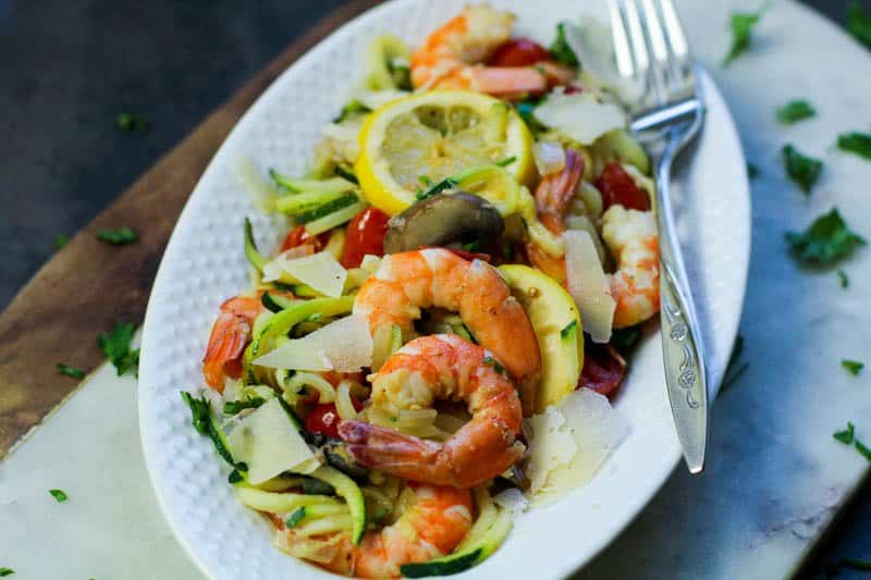 Low Carb Garlic Shrimp with Zoodles is the bomb! Anyone who tries this recipe is going to fall in love with the taste of the garlic shrimp and the zoodles. Shrimp is a yummy low carb option that many people don’t really think about. 