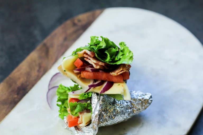 Low Carb turkey lettuce wrap on a marble tray