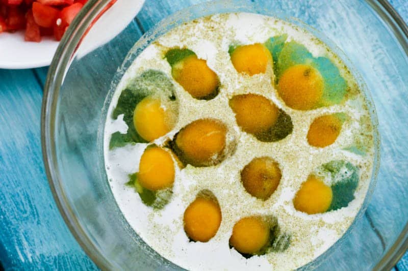 raw eggs and milk in bowl