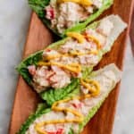 tuna salad on a wooden serving board