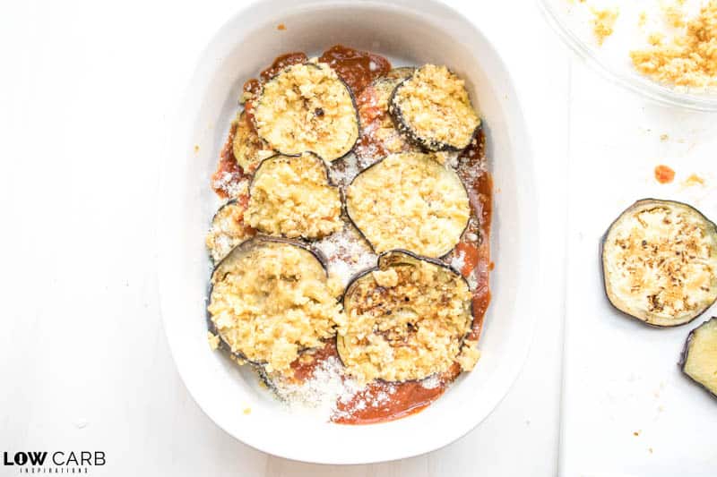sauce and eggplant in a casserole dish
