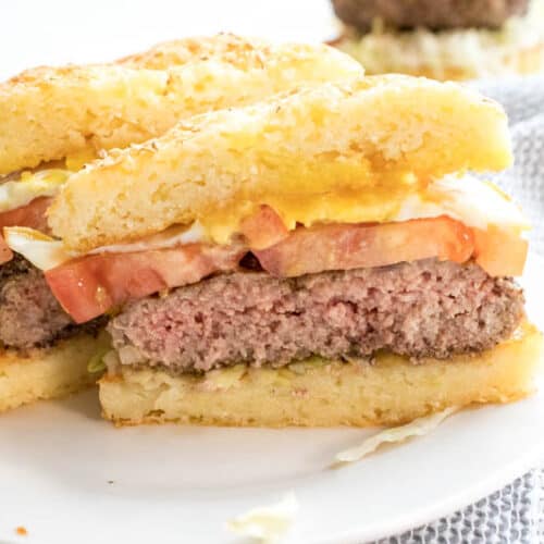 Low carb keto hamburger bun with burger, tomato and egg