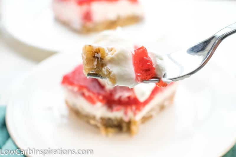 Keto Strawberry Pretzel Salad is a perfect dessert for any potluck! This keto friendly dessert uses pecans in place of pretzels to create a low-carb recipe you will love!