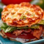 Keto BLT Chaffle Sandwich served on a blue plate