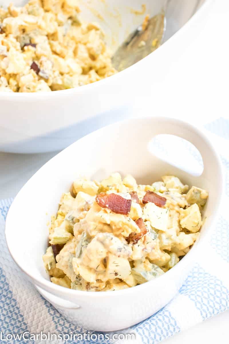 Impress your friends and family at the next gathering with this Keto Cauliflower Potato Salad Recipe! This is seriously delicious and everyone will gobble it up!