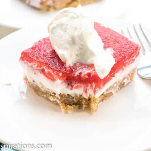 Keto Strawberry Pretzel Salad is a perfect dessert for any potluck! This keto friendly dessert uses pecans in place of pretzels to create a low-carb recipe you will love!