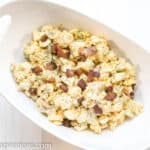 Impress your friends and family at the next gathering with this Keto Cauliflower Potato Salad Recipe! This is seriously delicious and everyone will gobble it up!