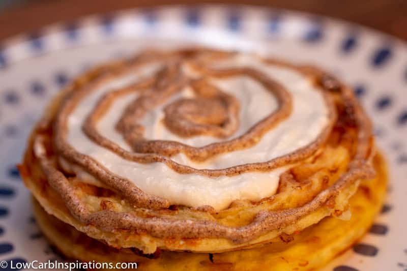 We just made a super easy Easy Soft Cinnamon Rolls Chaffle Cake Recipe that is going to change the way you make cinnamon rolls forever! This cinnamon rolls chaffle cake is great when you only want to make a single serving!  Oh, how I love chaffles!