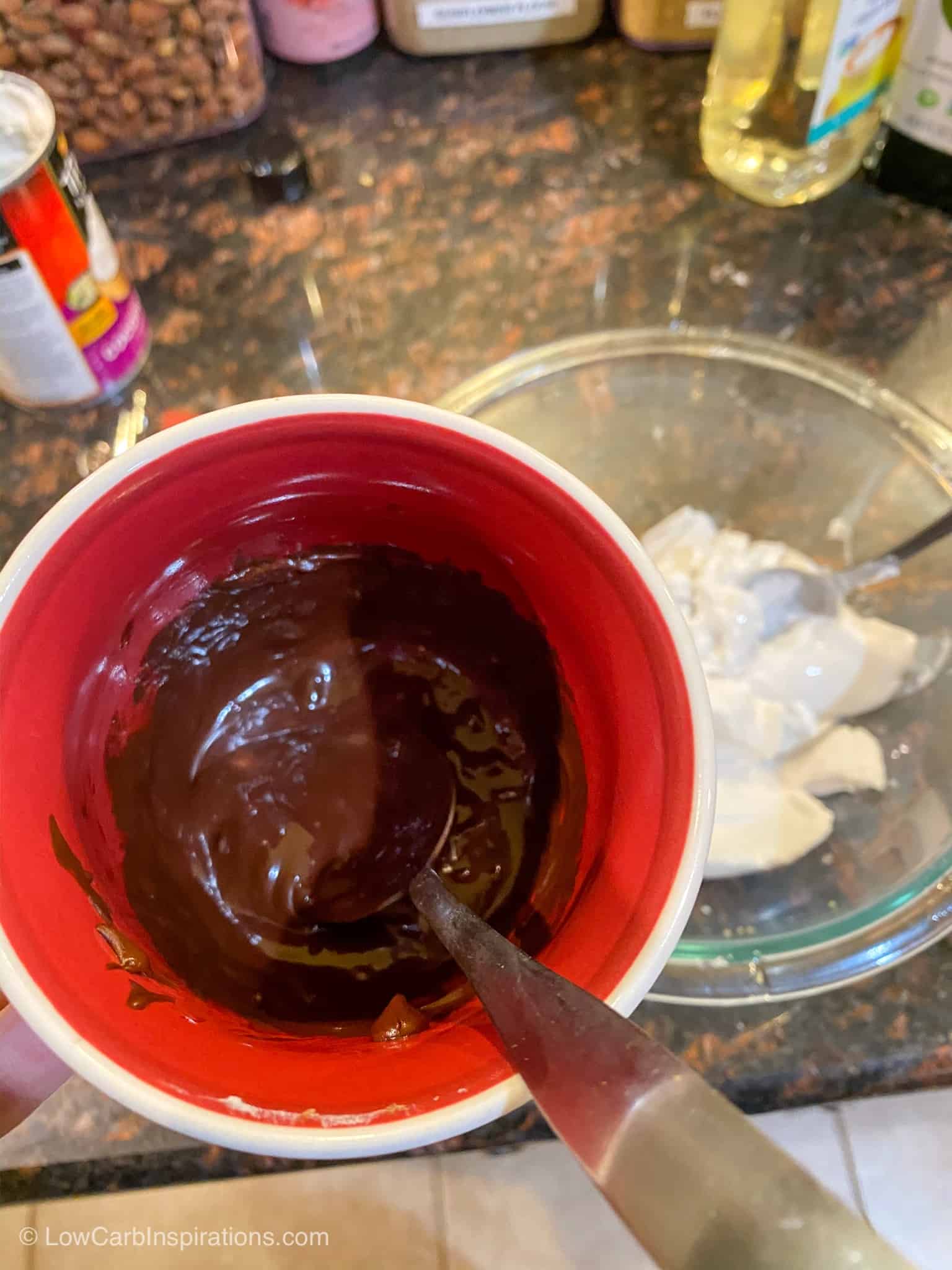 Melted chocolate in a mug cup