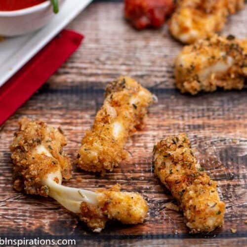 Plated cheese sticks with dipping sauce