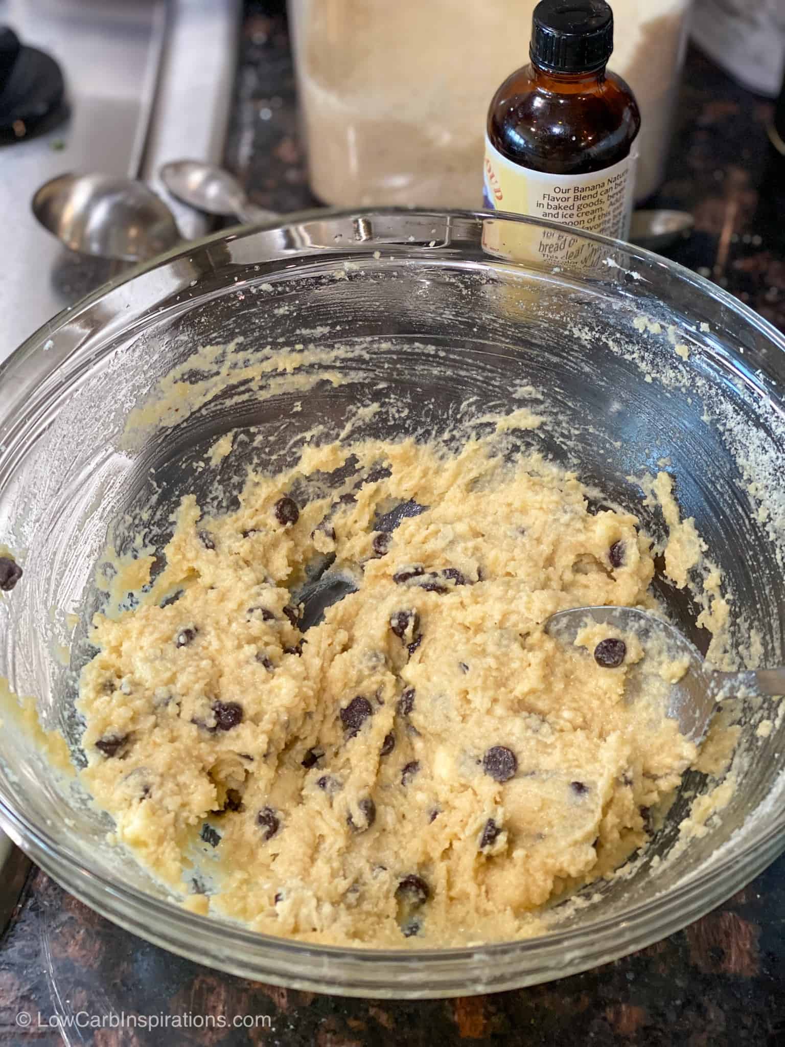 Batter for the Keto Chocolate Chip Banana Bread Recipe in a glass mixing bowl.