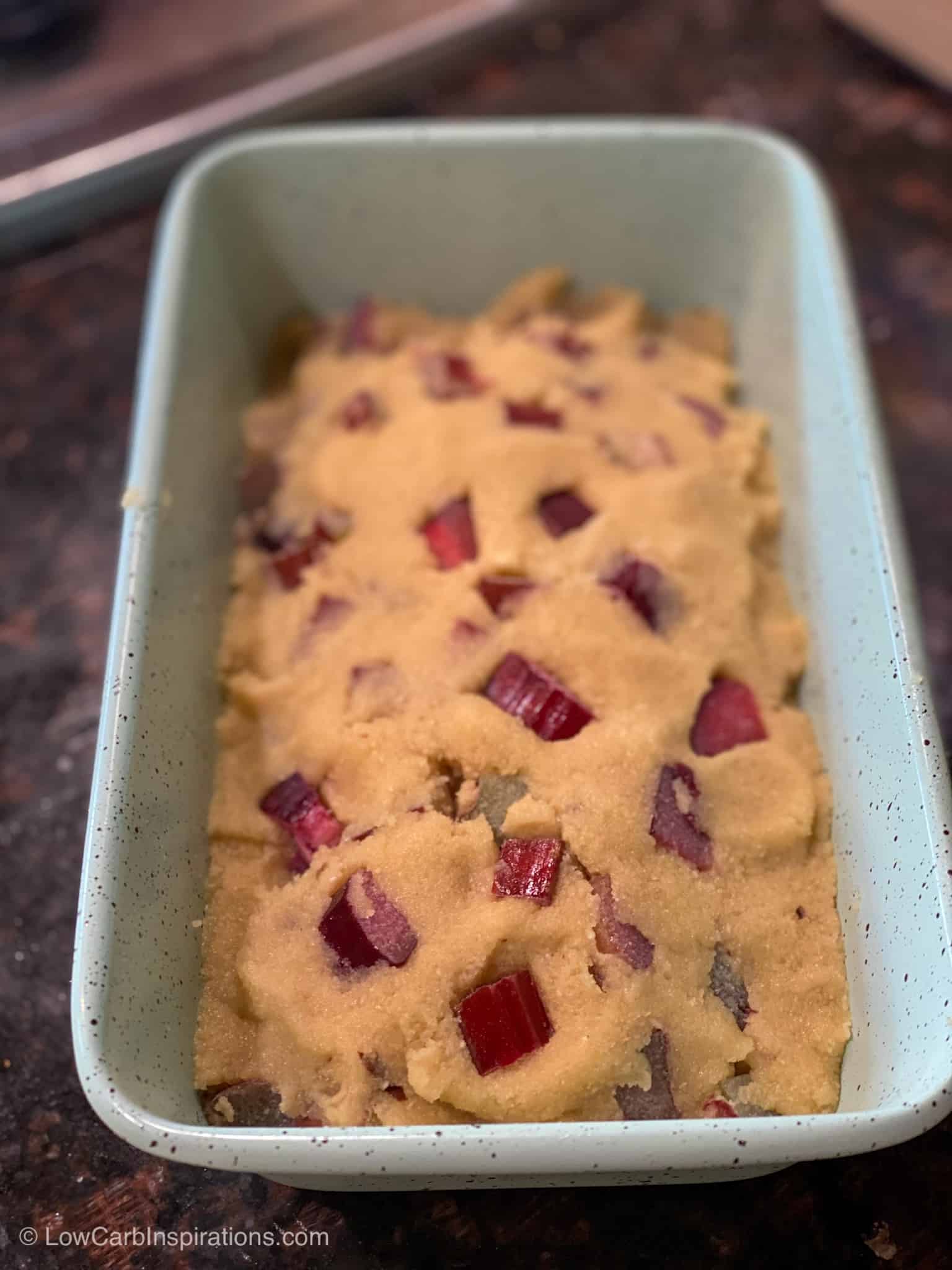 Keto Rhubarb Bread Recipe with a Glaze Topping before it's cooked