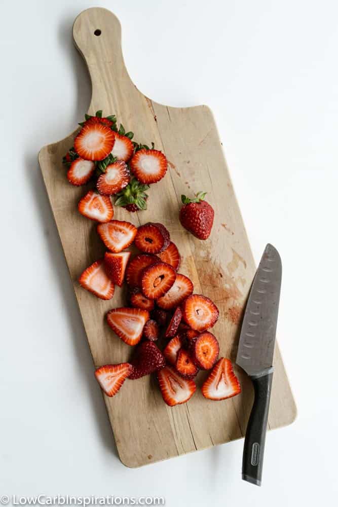 Chopped Strawberries on a cutting board