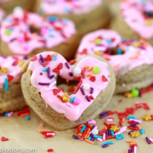 keto heart shaped glazed donuts with sprinkles on a table