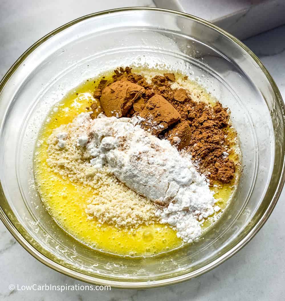 Bowl of wet and dry cake ingredients before mixing them up