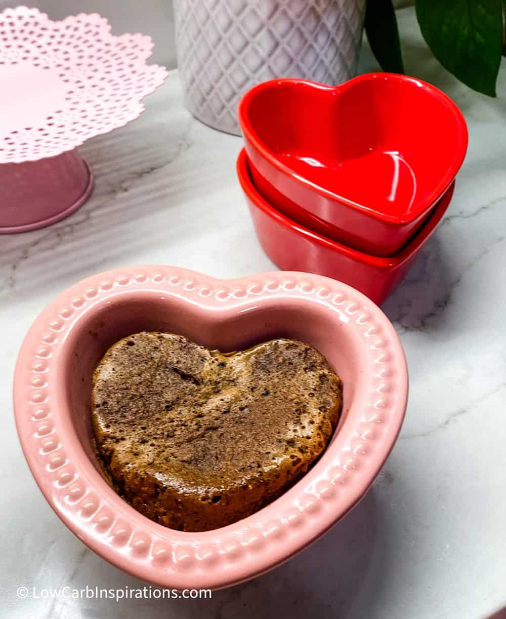 Heart shaped chocolate cake close up before any toppings are added.