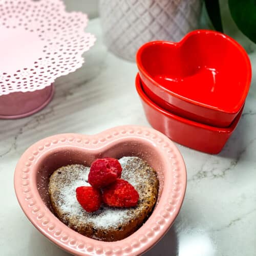 Finished cake topped with raspberries