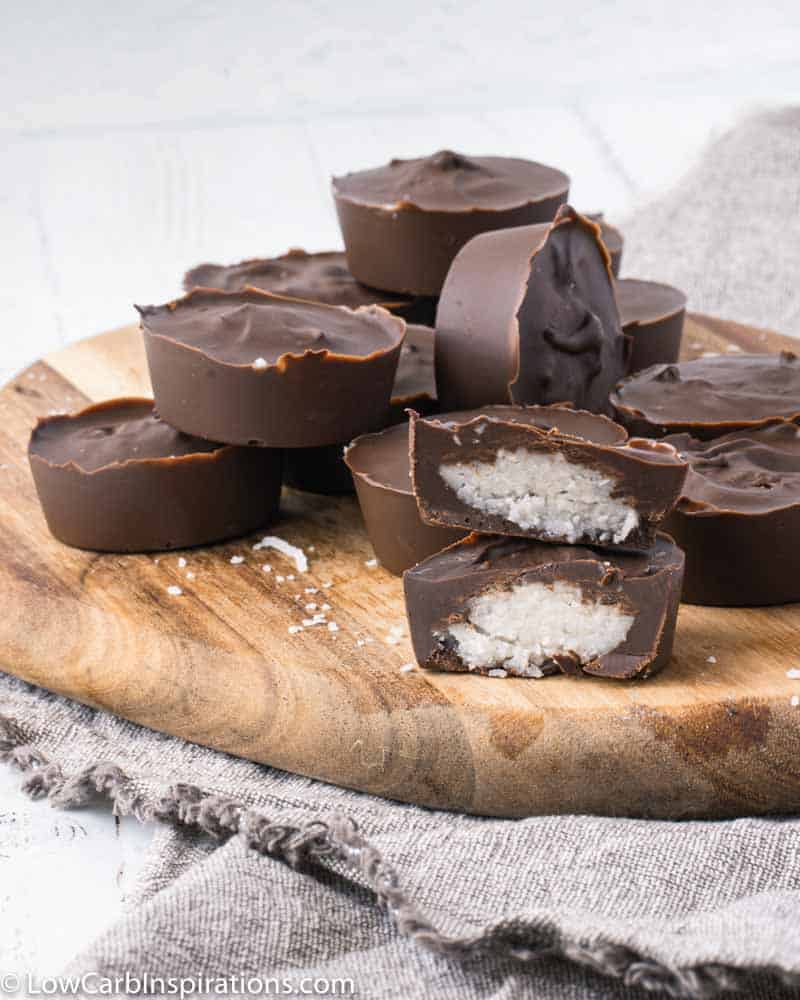 dark chocolate coconut bon bon recipe on a wood cutting board