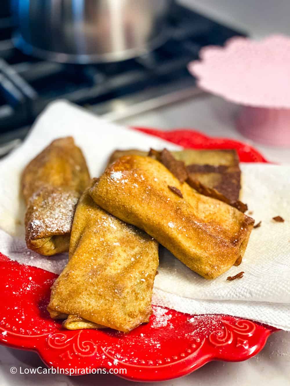 Keto Strudels hot and laying on a paper towel to soak up the excess oil