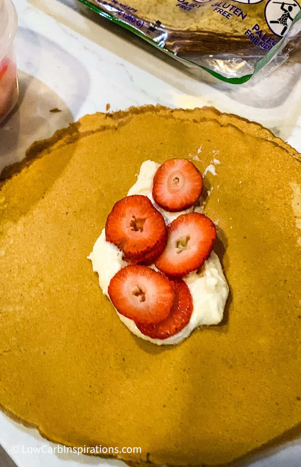 Crepini Egg Thin Wrap with cream cheese and strawberries