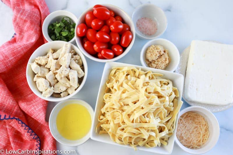 Low Carb Baked Feta Pasta Recipe ingredients in bowls on a table
