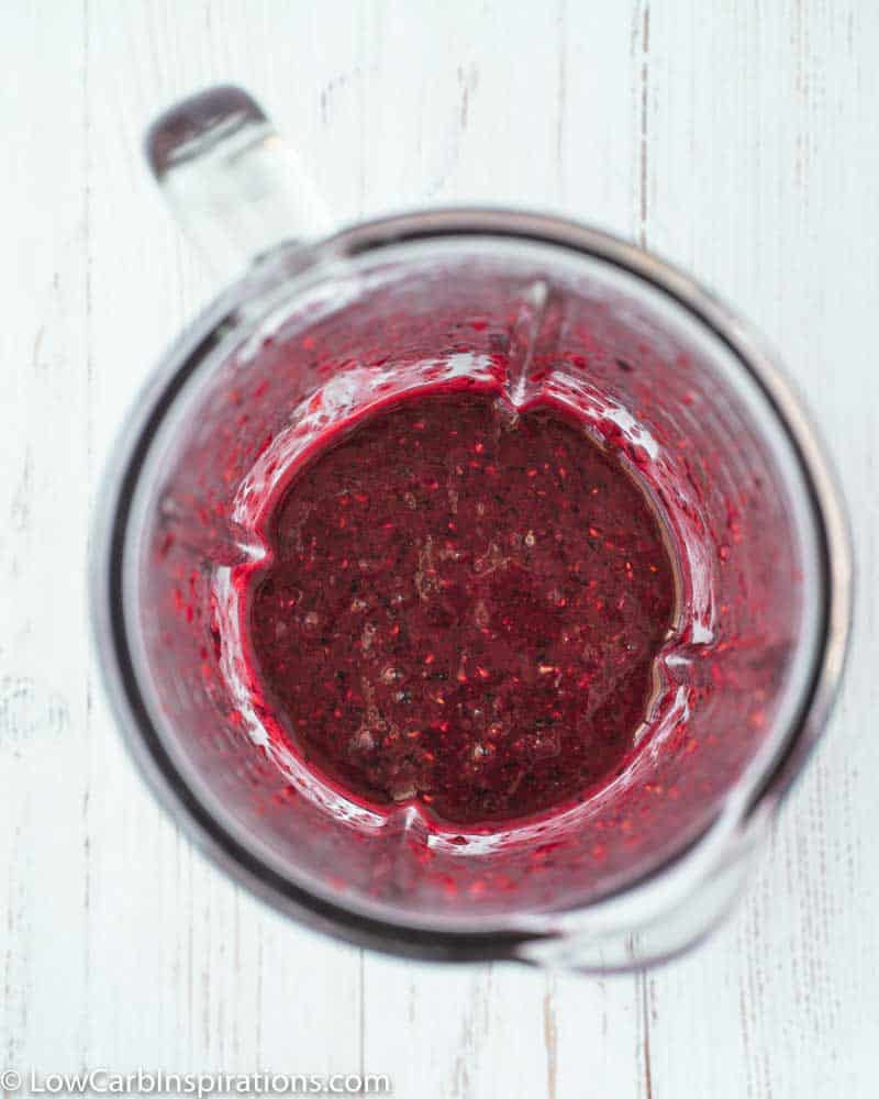 mixed berry compote ingredients in a blender blended together