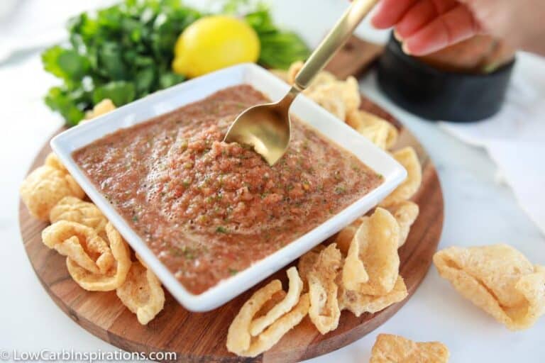 finished blender salsa recipe in a white square bowl with a gold spoon