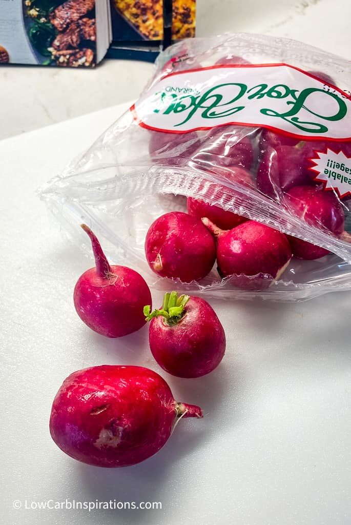 Raw radishes in a bag from the grocery store