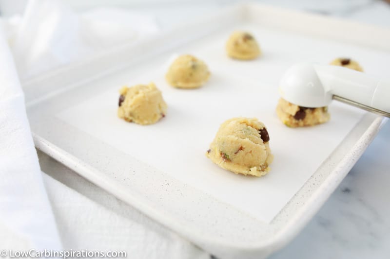sweet and salty cookie recipe scooped on a baking sheet lined with parchment paper