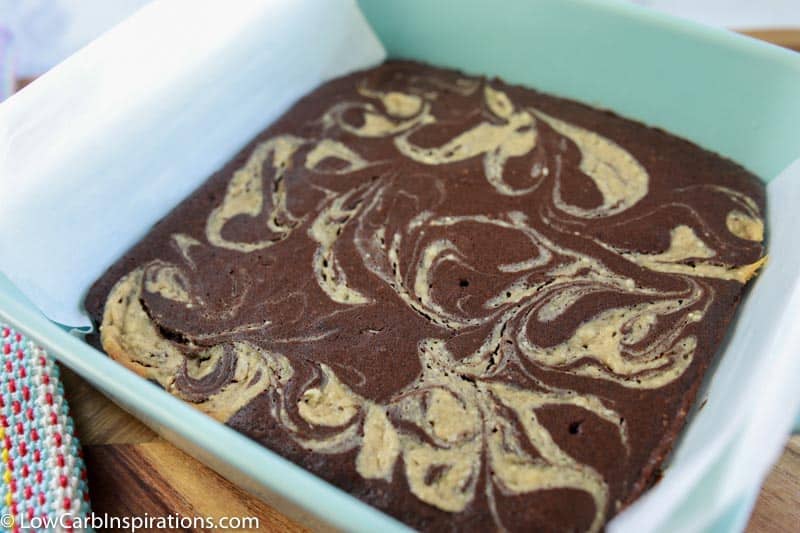 baked homemade keto brownies in a teal baking dish
