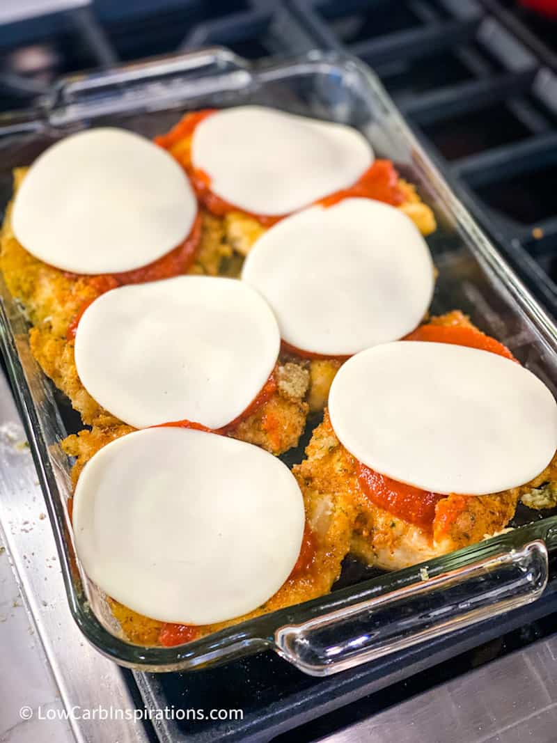 Chicken parmesan topped with cheese