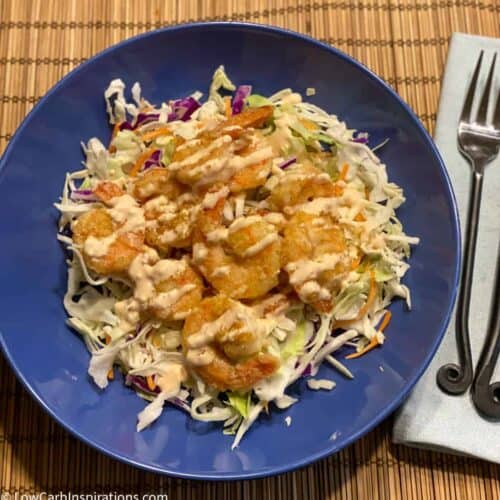 overhead photo of easy fried shrimp on a blue plate