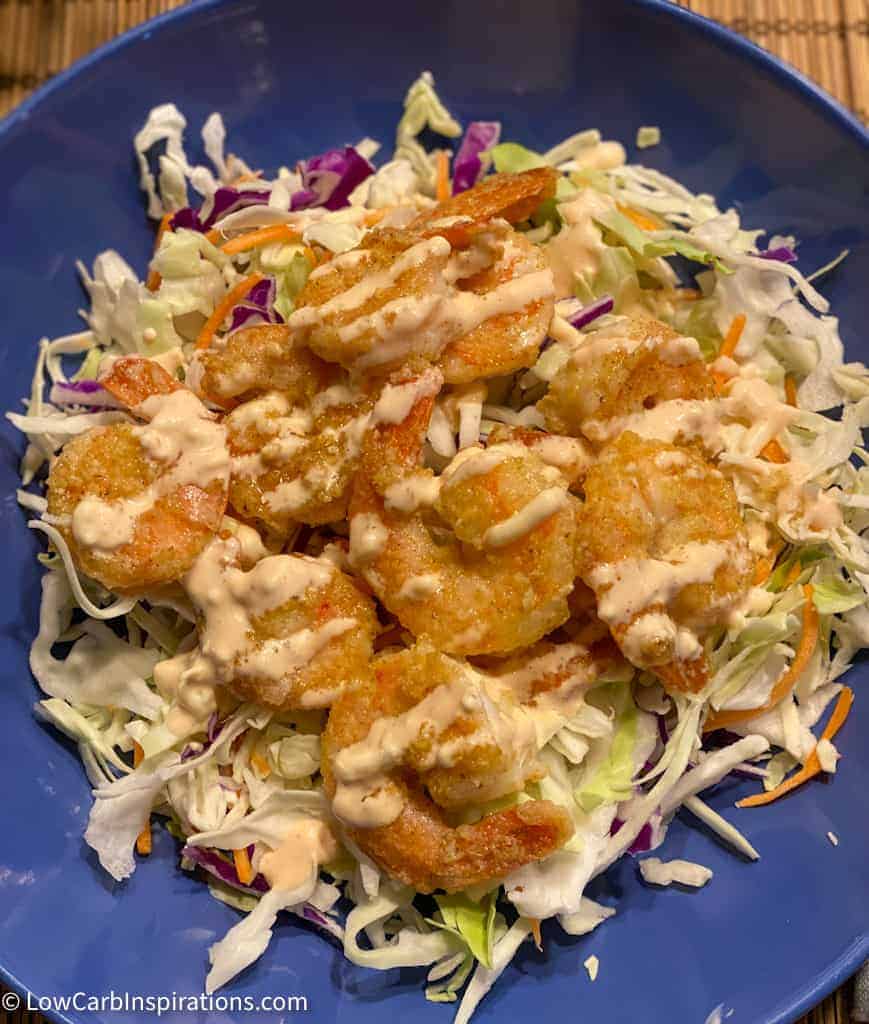 close up of finished keto fried shrimp recipe on a blue plate