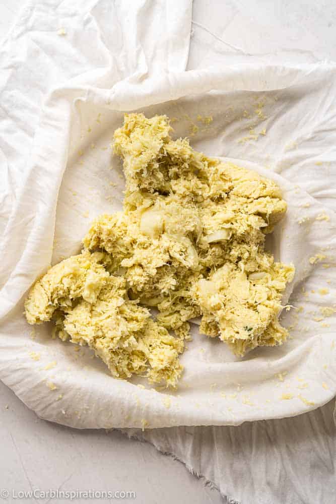 steamed cauliflower mashed in a cheesecloth