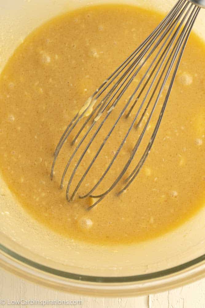 low carb blondie recipe ingredients in a bowl with a whisk
