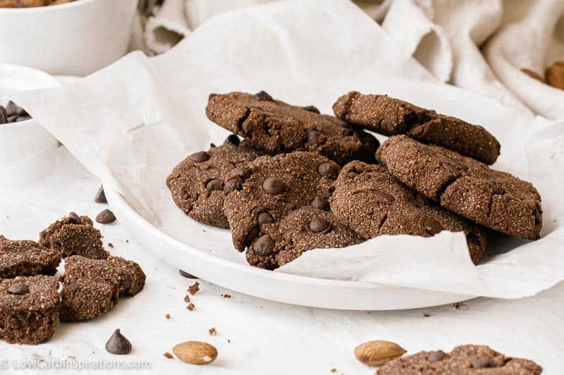 keto chocolate cookies on a plate with parchment paper