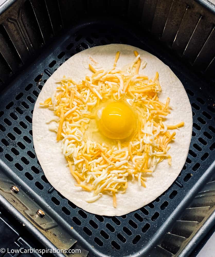 https://lowcarbinspirations.com/wp-content/uploads/2022/05/Keto-Bacon-Egg-Cheese-Taco-made-in-the-air-fryer-3.jpg