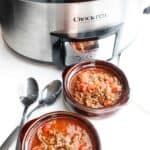 Slow Cooker Keto Chili Recipe in a bowl in front of a slow cooker
