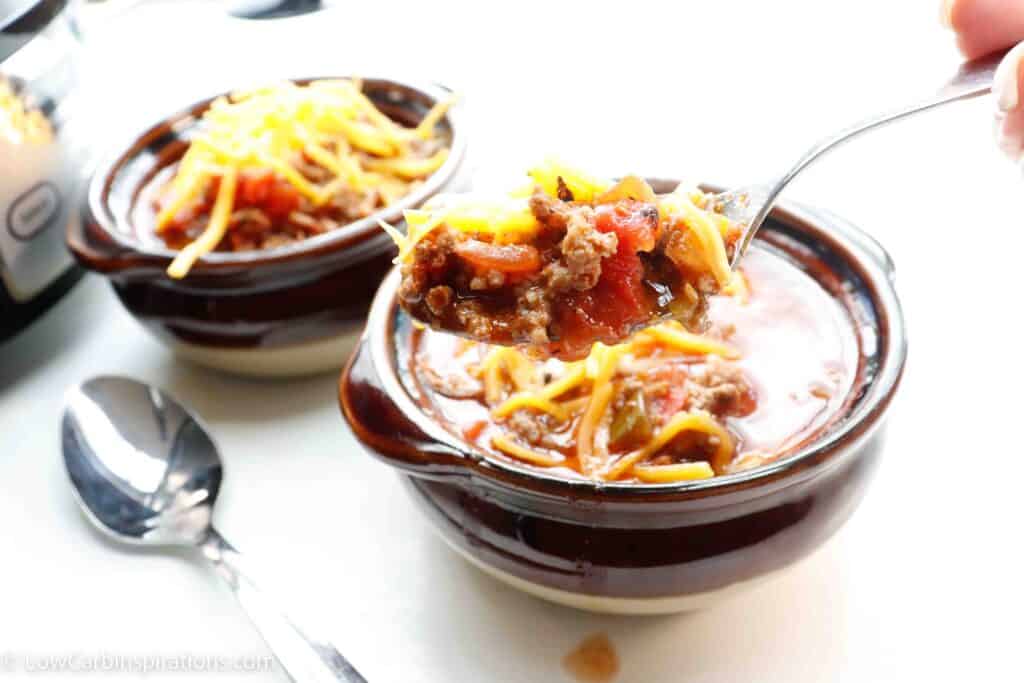 Slow Cooker Keto Chili Recipe in a bowl with a spoon of chili close up
