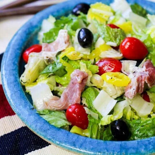 Low Carb Antipasto Salad on a teal plate